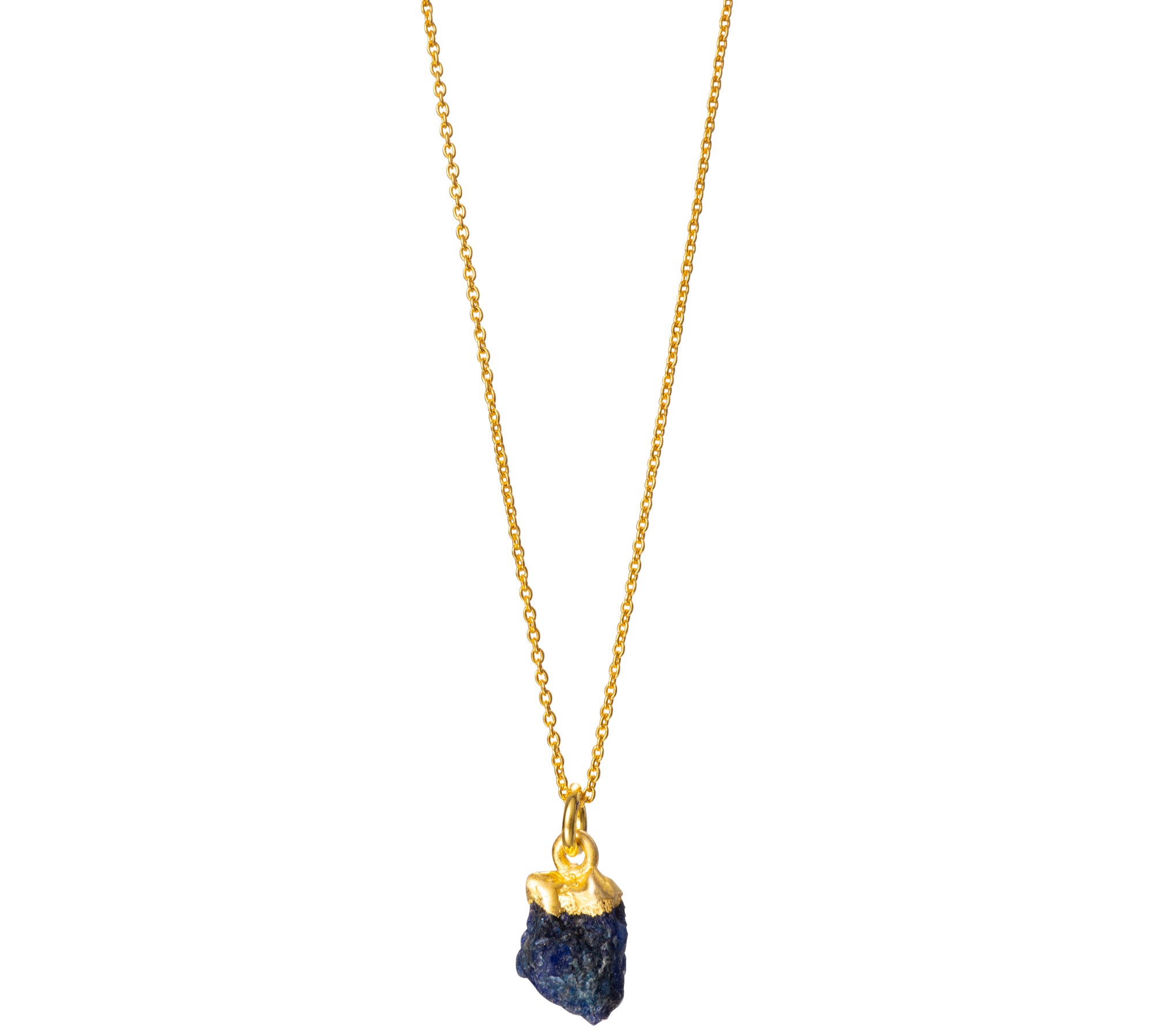 A raw Sapphire pendant electroplated in gold, hanging from a gold cable chain.
