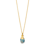 A raw Turquoise crystal pendant electroplated in gold, hanging from a gold-filled cable chain necklace.