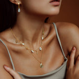 Terra - Gold Moonstone Charm Necklace with Tiger Concha Shells